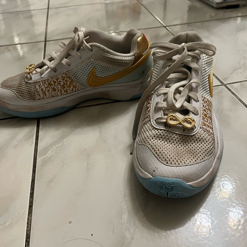 Nike White and Gold Athletic Shoes